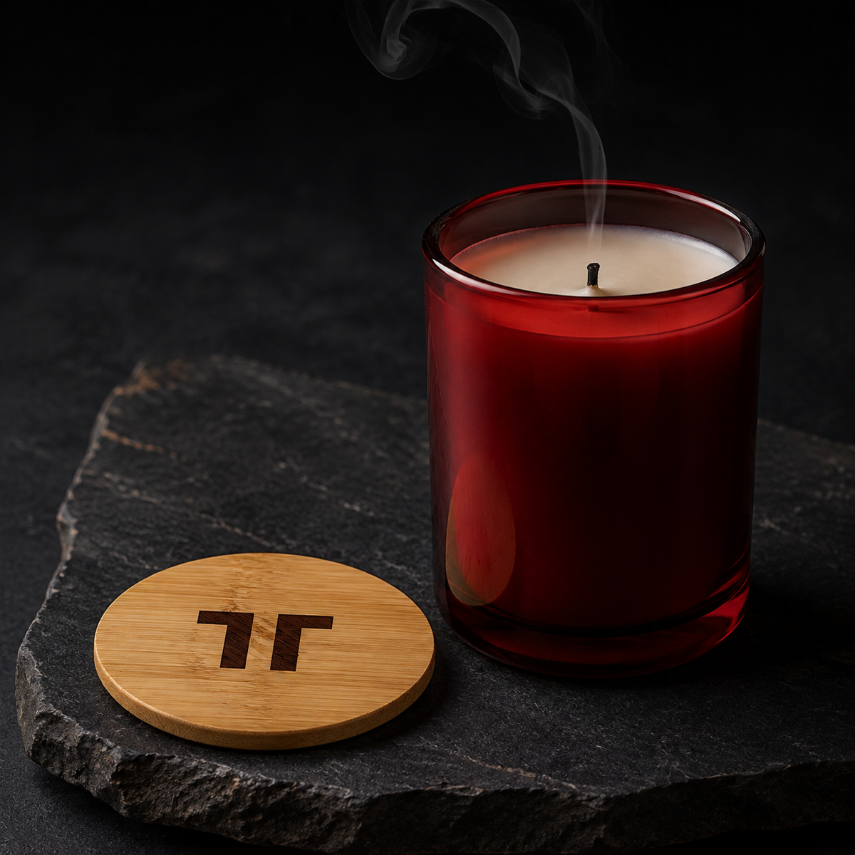 Detail of Bloodwood's Cranberry Glow glass and engraved bamboo lid