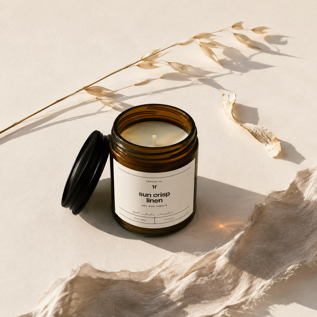 Open TenTen Sun Crisp Linen 255g candle with flax linen and dried oat stems
