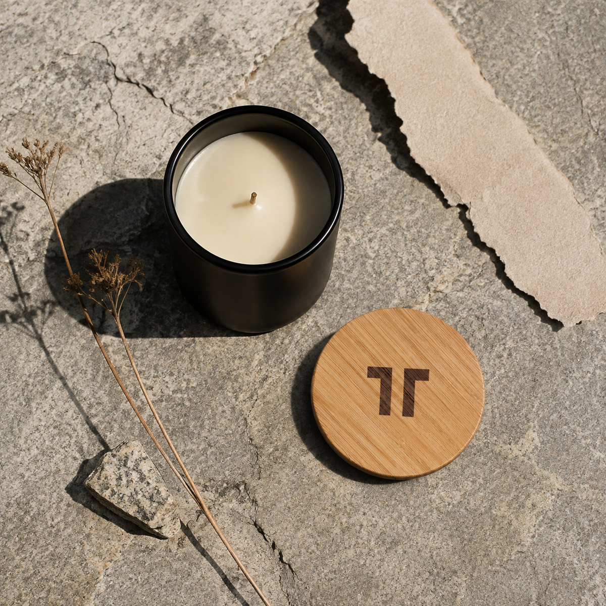 TenTen Darlington Quarry 390g matte black candle with bamboo lid on granite
